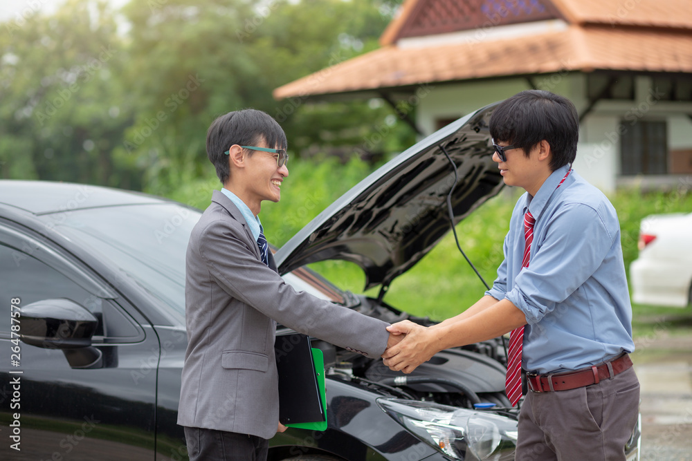 Insurance agent handshake with customer. Car insurance.