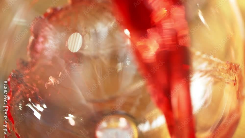 Super slow motion of splashing red wine in detail. Filmed on high speed cinema camera, 1000 fps Super slow motion of splashing red wine in detail. Filmed on high speed cinema camera, 1000 fps