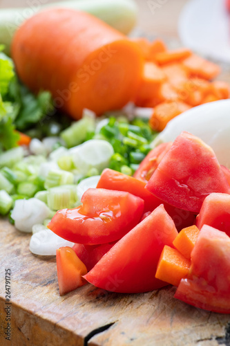 Sliced tomatoes and meny kind of vegetable