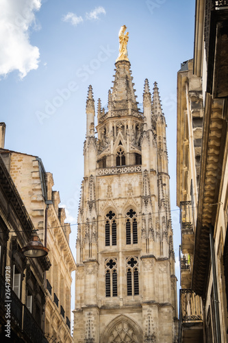 Close up on the Tower Pey Berland isolated in a blue spring sky from the street of the old city - Bordeaux, France © TheParisPhotographer