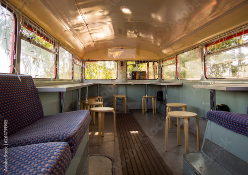 Alteration of the cabin of the old bus in a cafe with a bar © VPales