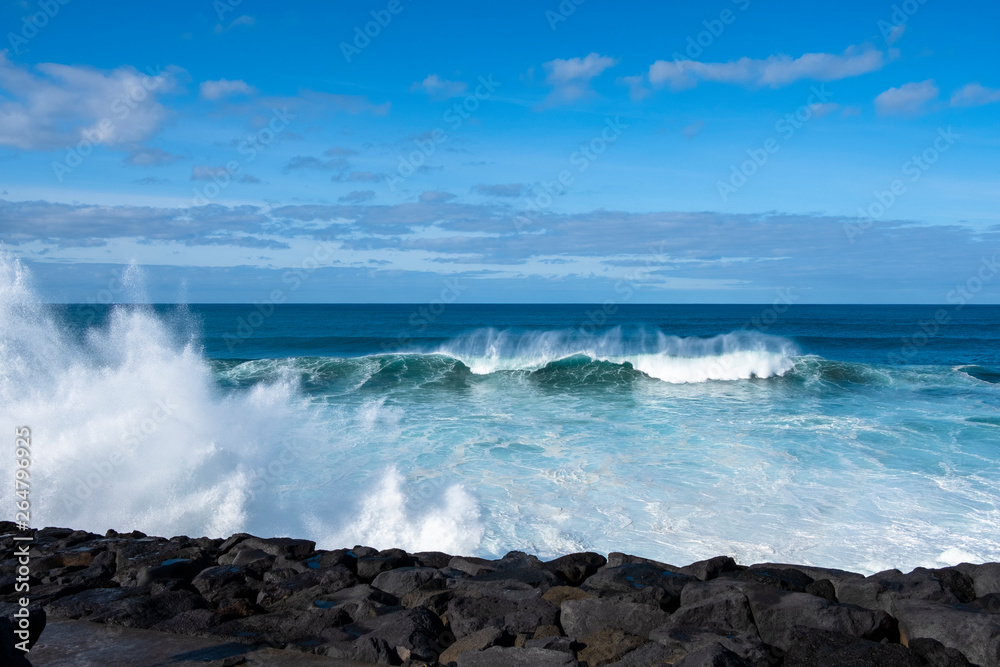 Big waves in move on the Atlantic Ocean in the coast of Sao Miguel island in the Azores, Portugal Big waves in move on the Atlantic Ocean in the coast of Sao Miguel island in the Azores, Portugal