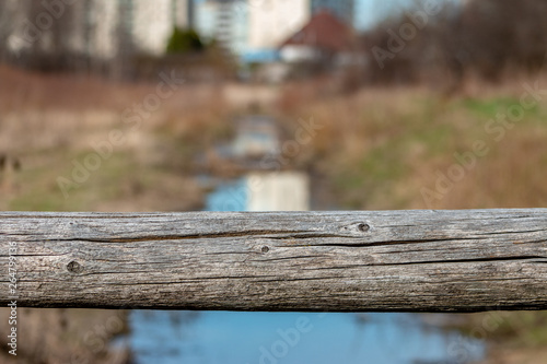 Detail of old rural fencing with shallow focus on single fence post