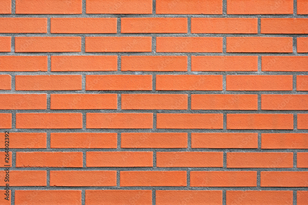 Fototapeta premium Red Brick wall for background or texture. New red brick wall texture background