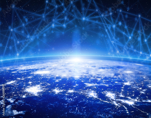 Global communication technology and telecommunication financial network around planet Earth. Blockchain and cryptocurrency concept with copyspace. IOT. Elements of this photo furnished by NASA.