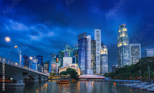 View of Singapore Skyline in Marina Bay, central business district at night.