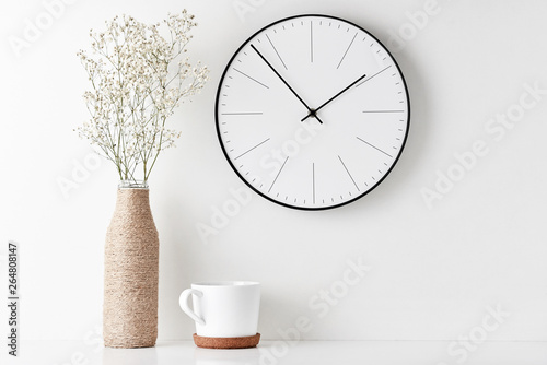 Home office minimal workspace desk with wall clock