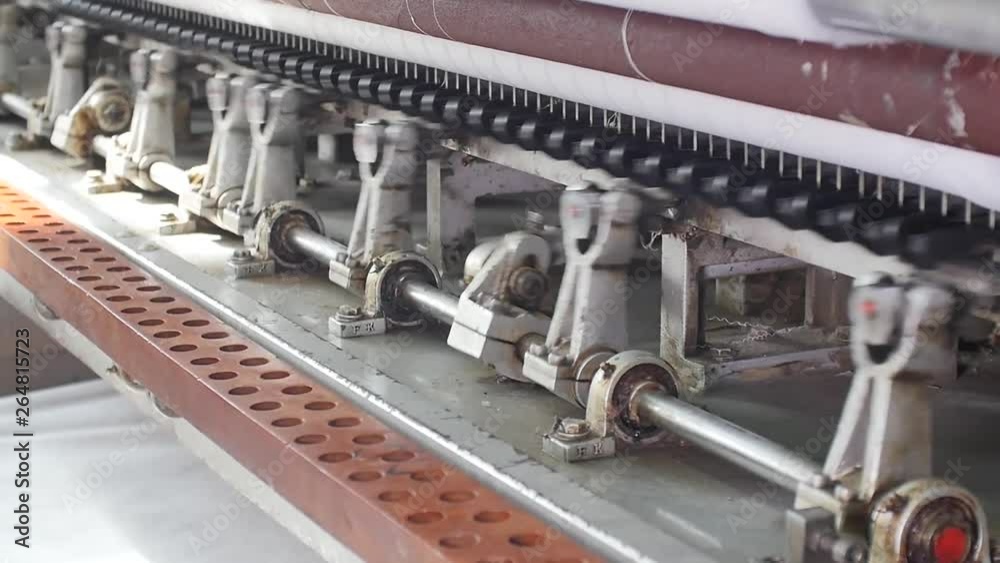 Loom machine detail in motion. Weaving industry
