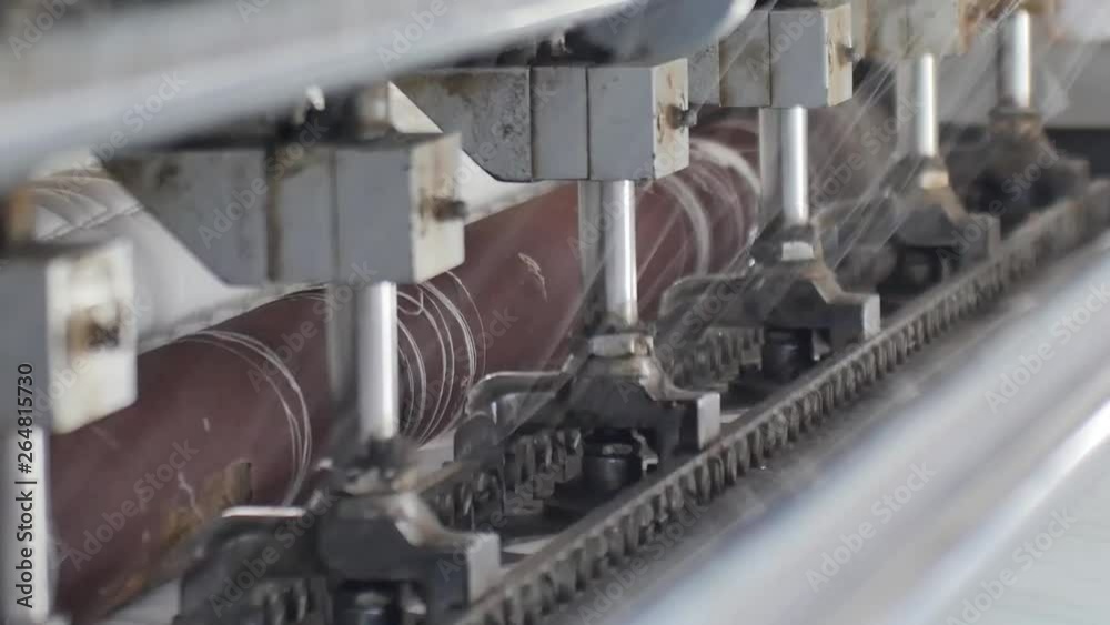 Close up on quilting process in mattresses factory Close up on quilting process in mattresses factory