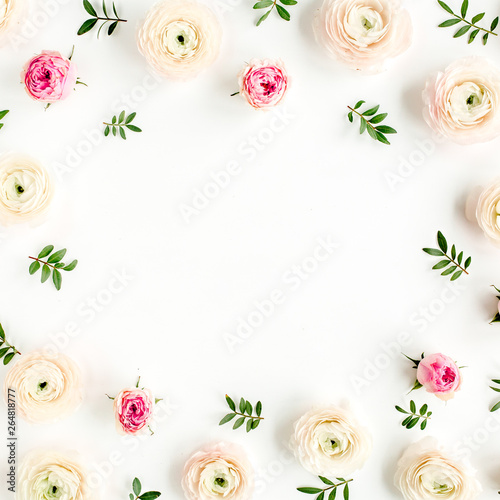 Floral background frame made of pink ranunculus and roses flower buds on white background. Flat lay, top view floral background.