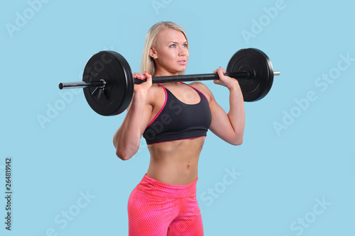 Fitness young girl doing exercises