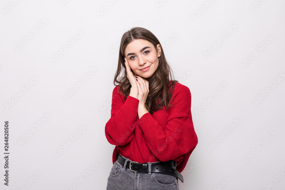 Young woman wear in sweater isolated on gray background Young woman wear in sweater isolated on gray background