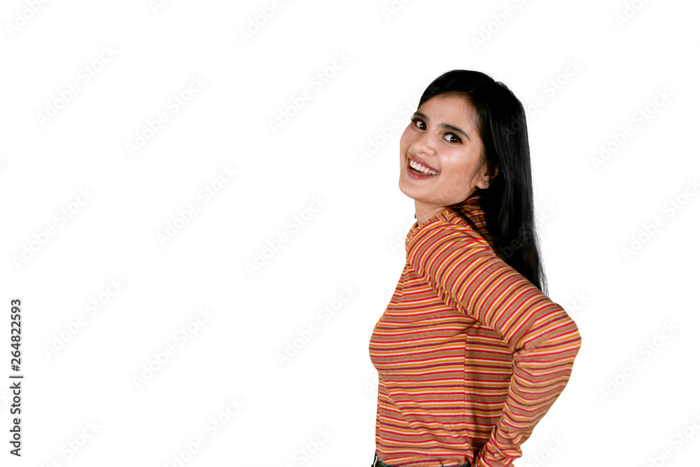 Pretty girl standing with copy space on studio Pretty girl standing with copy space on studio
