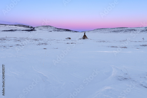 Sunset over nomad fisherman camp in the Arctic tundra. Polar Ural. © longtaildog