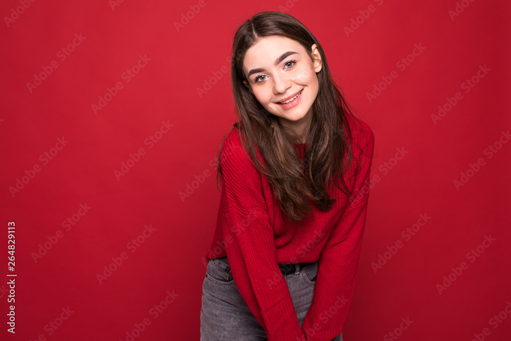 Profile side view photo of fold cross hands over chest person, stand half turn in casual wear isolated on bright red background Profile side view photo of fold cross hands over chest person, stand half turn in casual wear isolated on bright red background