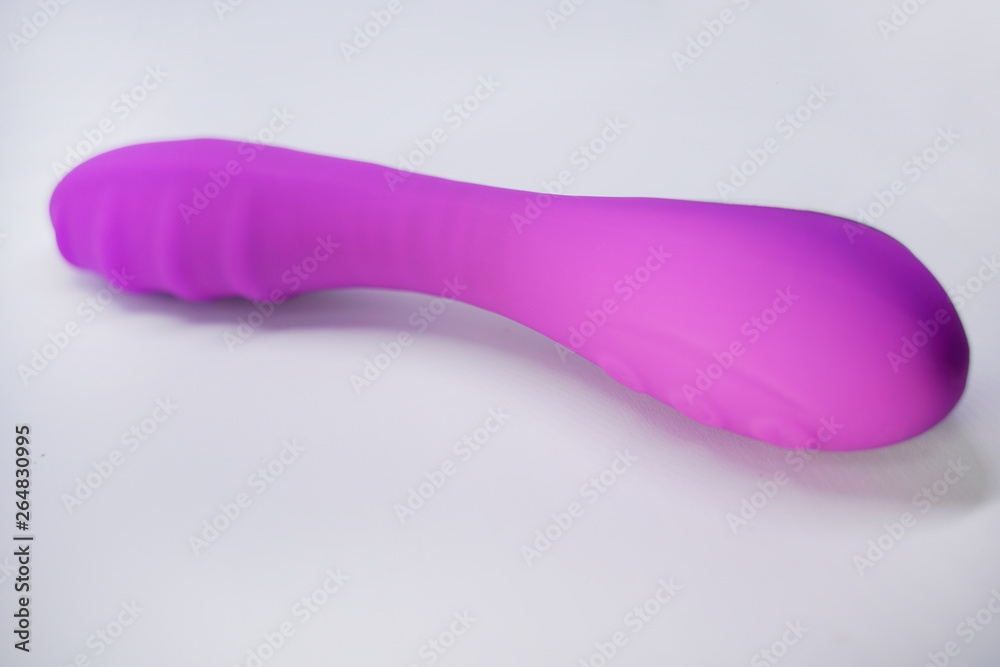 Bright sex toys on white background in the studio isolated Bright sex toys on white background in the studio isolated