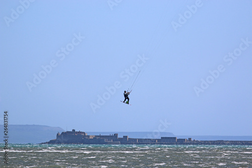 kitesurfer jumping in Portland Harbour