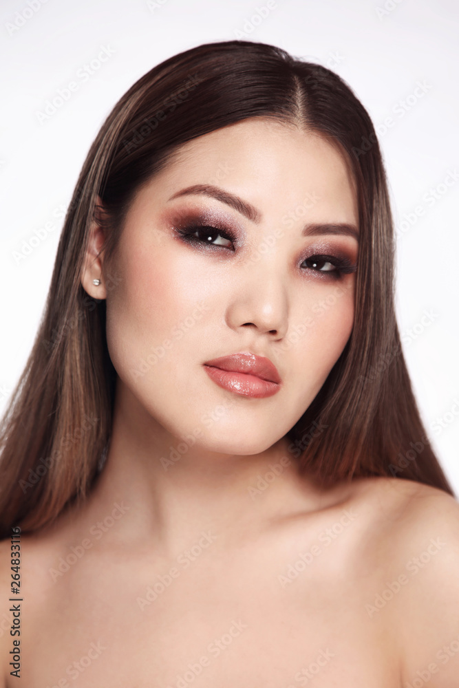 Portrait of young beautiful asian girl with smoky eye makeup Portrait of young beautiful asian girl with smoky eye makeup