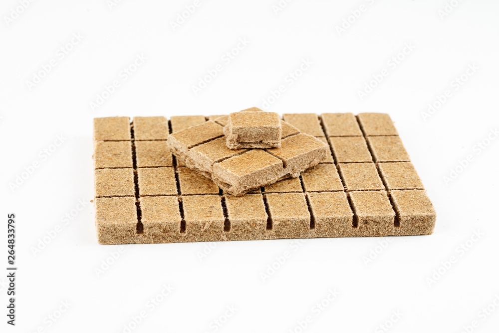 Dry fuel for kindling fires on a white background