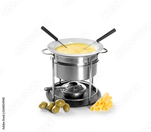 Fondue pot with melted cheese and olives on white background