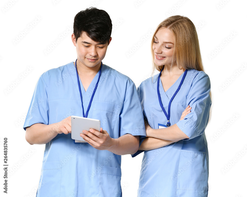 Portrait of medical assistants with tablet computer on white background Portrait of medical assistants with tablet computer on white background