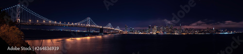 Panorama of San Francisco skyline at night with bay bridge. San Francisco California  CA  USA.