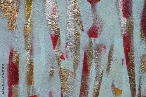 pieces of cut colored paper. the adhesive tape is painted in several layers. background of complex color texture