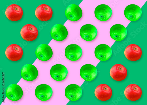 Colorful pattern of red and green apple. green and pink background