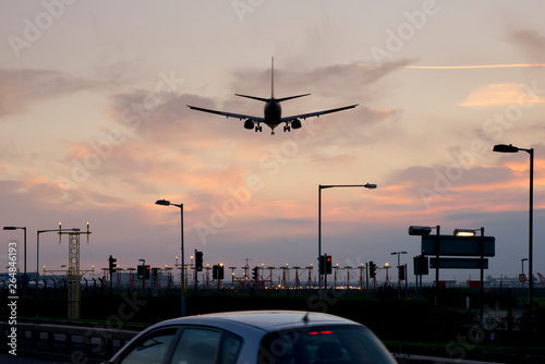 Airplane Boeing 737 approaching at sunset