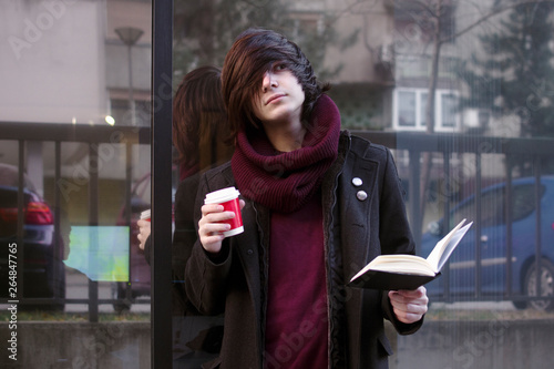 student on coffee break