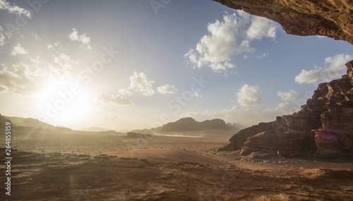 Amazing sunset at the Jordanian desert of Wadi Rum ,this breathtaking sunset will really blow your mind. Its stunning to see how the sun disappearing slowly behind those iconic mountains.