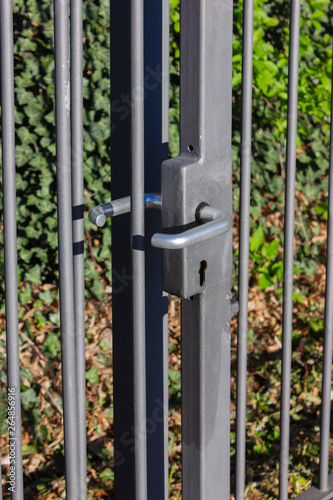 iron garden fence with lock