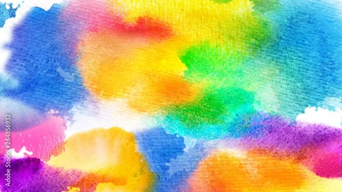 Beautiful multicolored, colorful spots and blots appear on a white background. Bright cyan, yellow, red and orange paints spreads on paper forming an abstract drawing background.. 4K motion graphic.