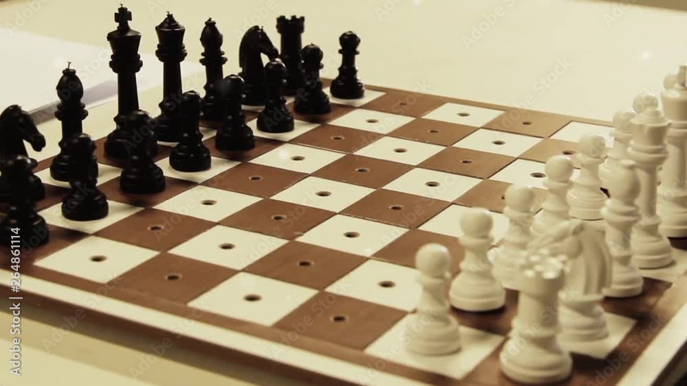 Tactile Chess Game, Chess Set for Visually Impaired (Blind) Players. Each Piece has a Peg that Inserts into the Board, allowing for Tactile Use of the Entire Board while Considering a Chess Move. Tactile Chess Game, Chess Set for Visually Impaired (Blind) Players. Each Piece has a Peg that Inserts into the Board, allowing for Tactile Use of the Entire Board while Considering a Chess Move.