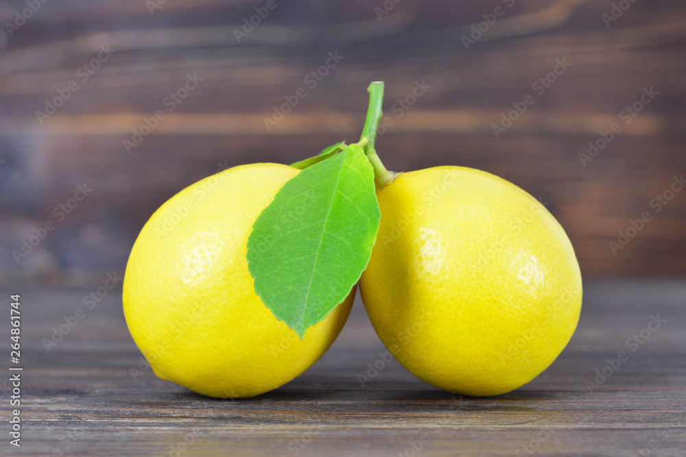 Close up of lemons on wooden background