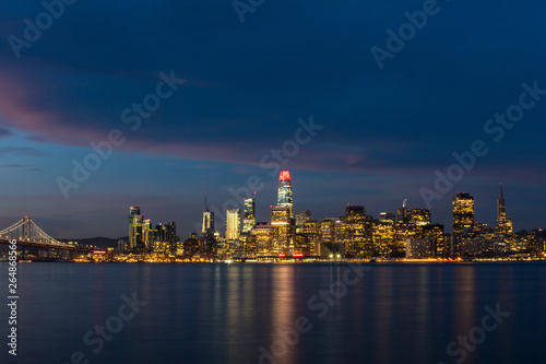 The northern California city of San Francisco skyline is seen at dawn. This beautiful city is surrounded by San Francisco Bay and the Pacific Ocean.
