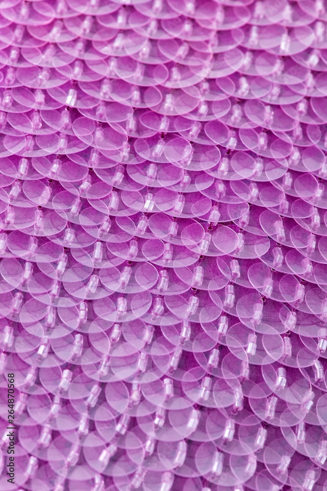 Fabric with sequins and sequins of bright colors. Fashion glitter fabric, sequins. Shiny surface Fabric with sequins and sequins of bright colors. Fashion glitter fabric, sequins. Shiny surface