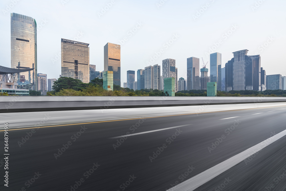 empty asphalt road with city skyline background in china.