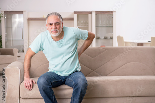 White bearded old man suffering at home  © Elnur