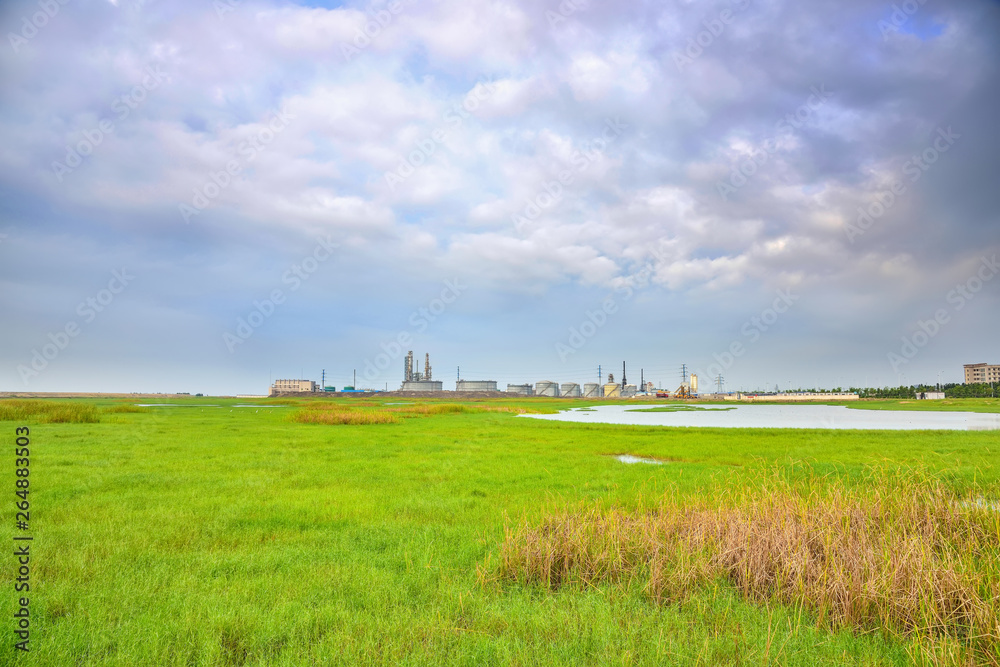 With the natural ecological grass refinery storage tanks With the natural ecological grass refinery storage tanks