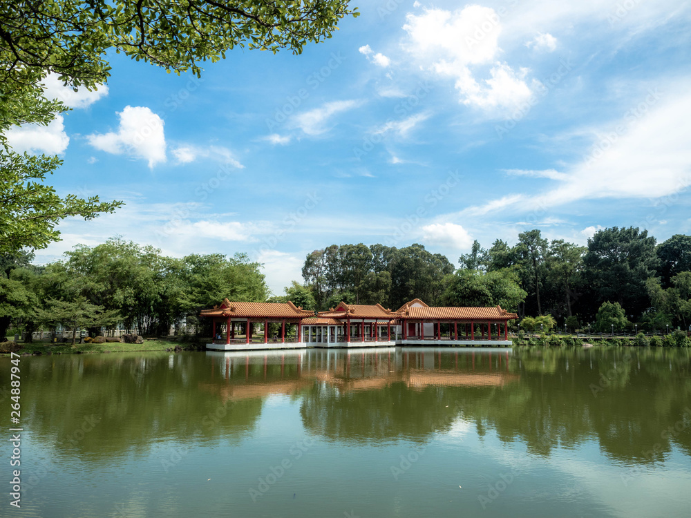 Fototapeta premium Singapore Nov 26, 2018: Traditional Chinese pavilions on the lake at The Chinese Gardens (Lake, bridge, and Twin Pagoda), Singapore.