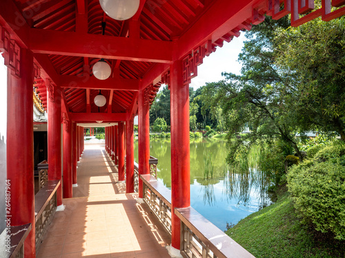 Photography Singapore Nov 26, 2018: Traditional Chinese pavilions on the lake at The Chinese Gardens (Lake, bridge, and Twin Pagoda), Singapore