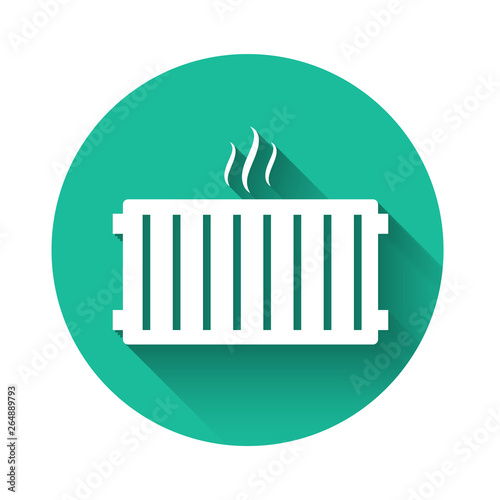 White Heating radiator icon isolated with long shadow. Green circle button. Vector Illustration