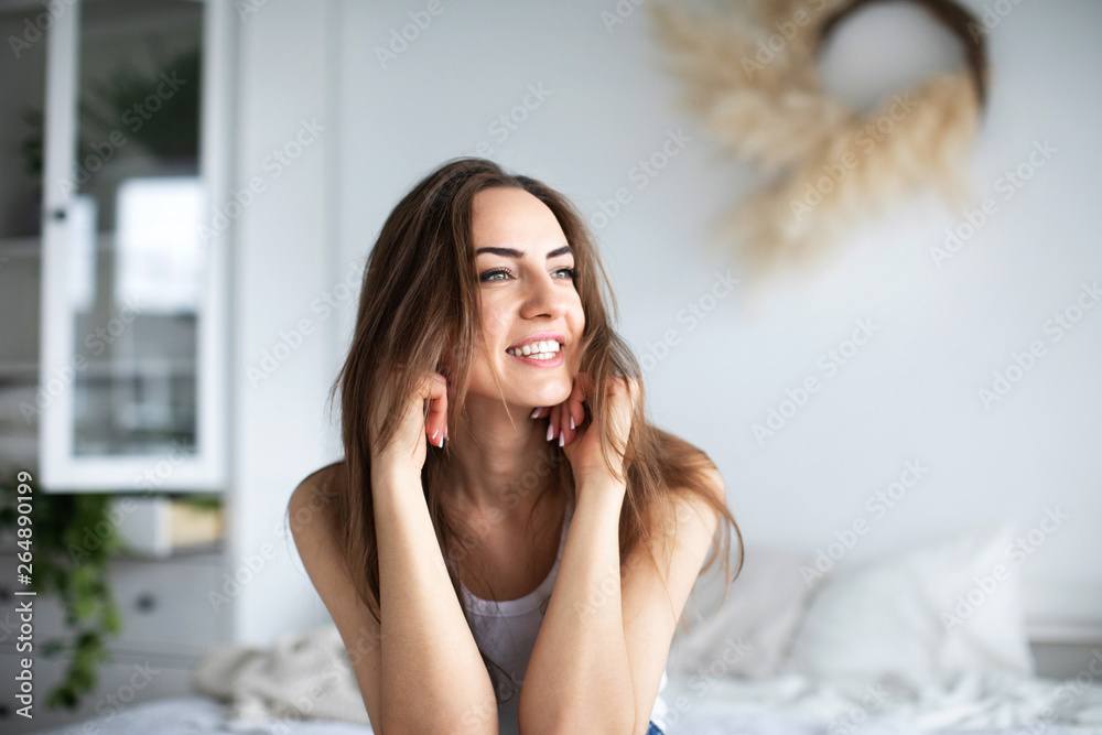 Beautiful smiling happy woman at home. - obrazy, fototapety, plakaty 