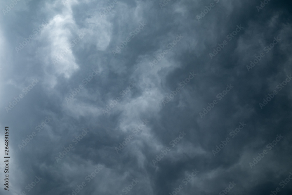 Light in the Dark and Dramatic Storm Clouds background Light in the Dark and Dramatic Storm Clouds background