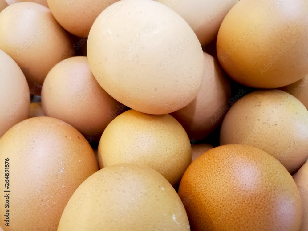 Closeup and crop of heap brown chicken eggs. Closeup and crop of heap brown chicken eggs.