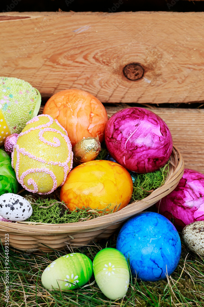 Wicker basket with Easter eggs. Wicker basket with Easter eggs.