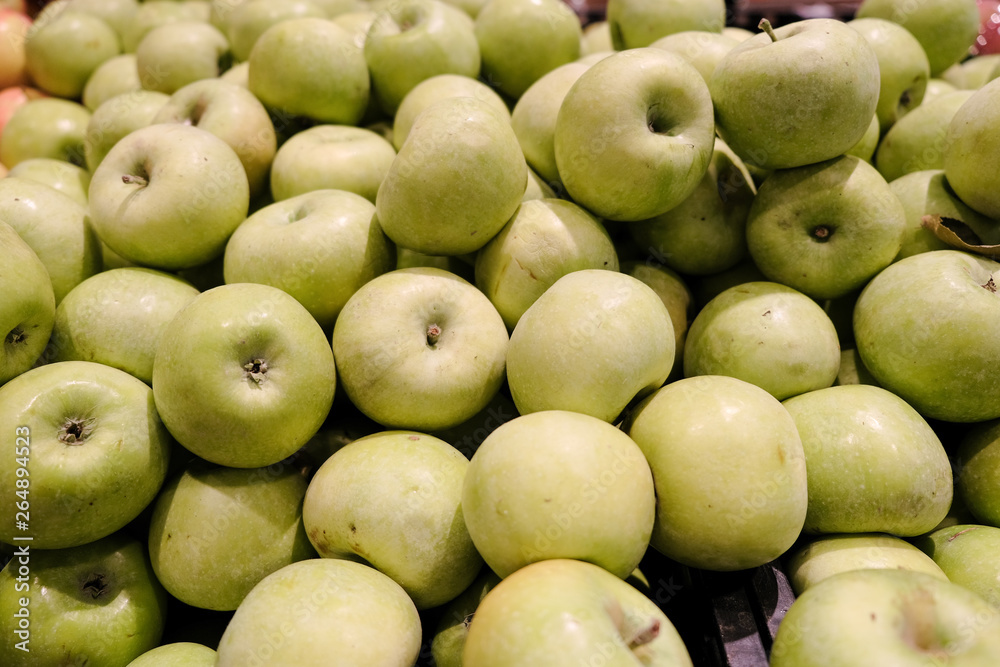 juicy and fresh apples background. Fruits at market juicy and fresh apples background. Fruits at market