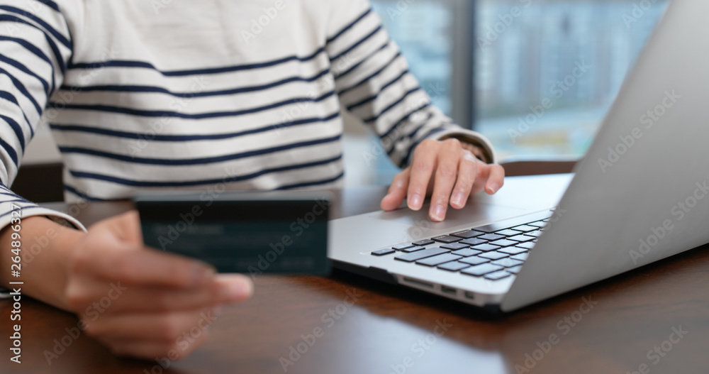 Woman use of laptop computer for online shopping Woman use of laptop computer for online shopping