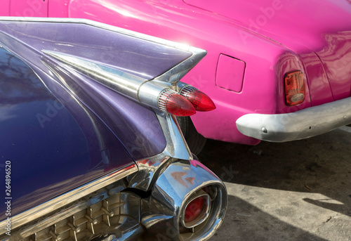 Purple and Pink Classic American Cars in Havana Cuba
